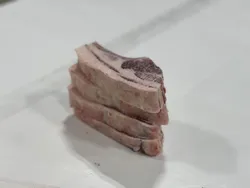 A stack of lamb chops.